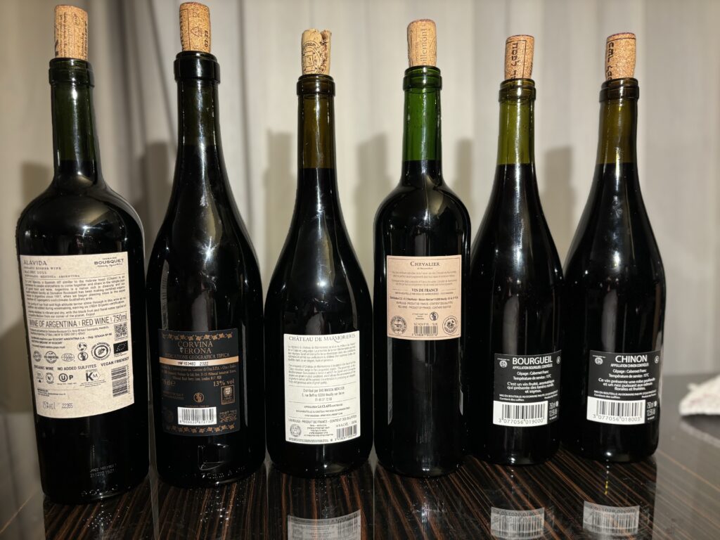 2022 Domaine Bousquet, Alavida, Mendoza (back label); N.V. Cantine Di Ora Amicale, Rosso, Limited Edition, Corvina Oak Aged, Veneto (back label); 2021 Château de Marmorières, Les Amandiers, La Clape, Languedoc (back label); 2021 Chevalier de Marmorieres, Cabernet Sauvignon, Vin de France (back label); 2022 Philippe Paine, La Petite Metairie, Bourgueil (back label); 2022 Philippe Paine, La Petite Metairie, Chinon (back label);