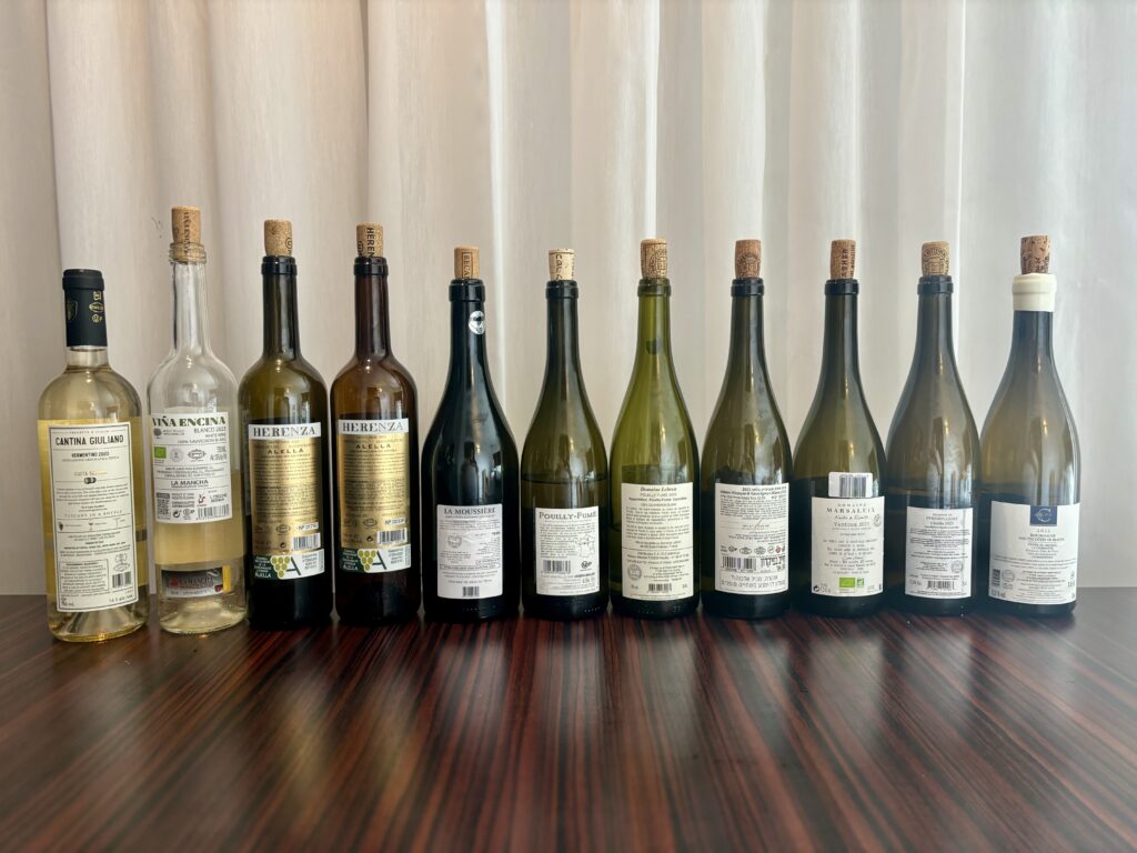 2023 Cantina Giuliano, Vermentino, Tuscany; 2023 Elvi Wines, Vina Encina, White; 2022 Elvi Wines, Herenza, White; 2023 Elvi Wines, Herenza, White; 2022 Alphonse Mellot, Sancerre, La Moussier; 2022 Joseph Mellot, Pouilly Fume, Le Chant des Vignes; 2023 Domaine Lebrun, Pouilly Fume; 2021 Recanati, Atelier, Odem Mountain Sauvignon Blanc; 2020 Domaine Marsaleix, Ventoux Naître & Renaître Blanc; 2023 Domaine de Perdry Court, Chablis, Remi Courty; 2022 Charles Pere & Fille, Bourgogne, Hautes Cotes De Beaune, La Combotte, Cuvee Du Menhir; (back labels)
